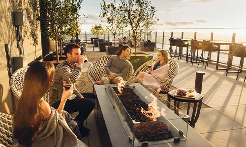 People enjoying time on the Ojai Deck